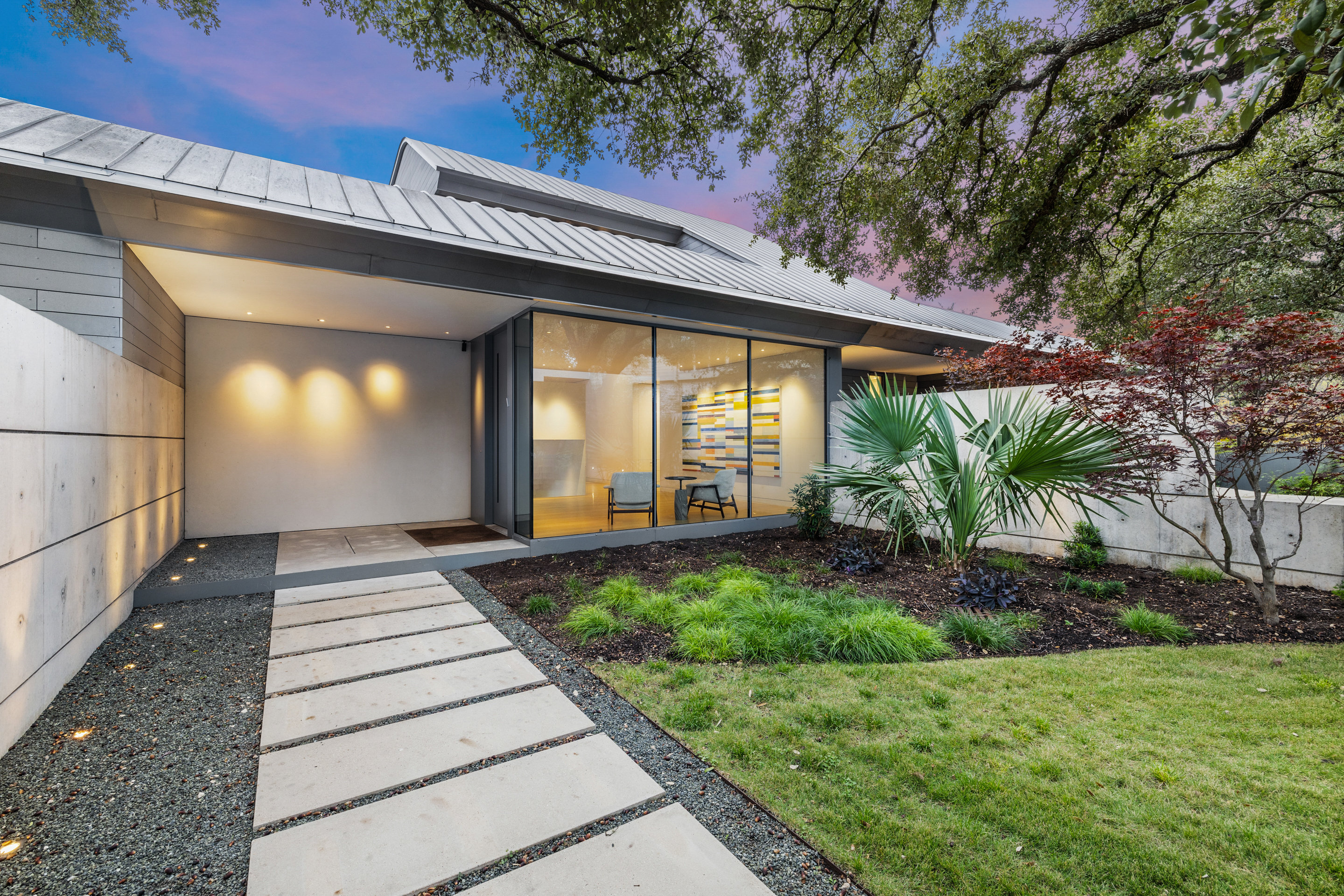 East elevation with floor-to-ceiling German windows and Oko Skin cladding
