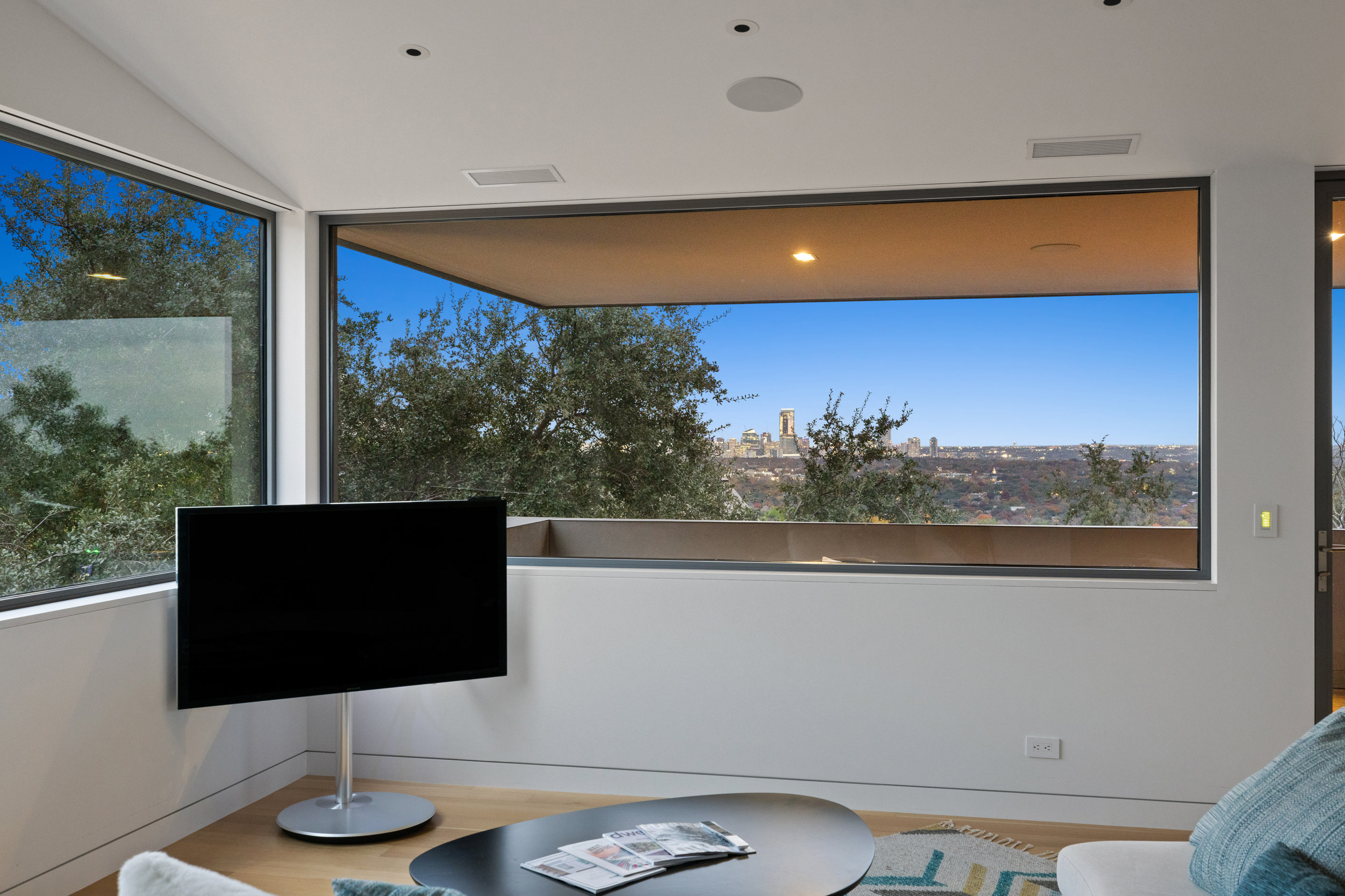 Living room seating area with George Nelson saucer pendant