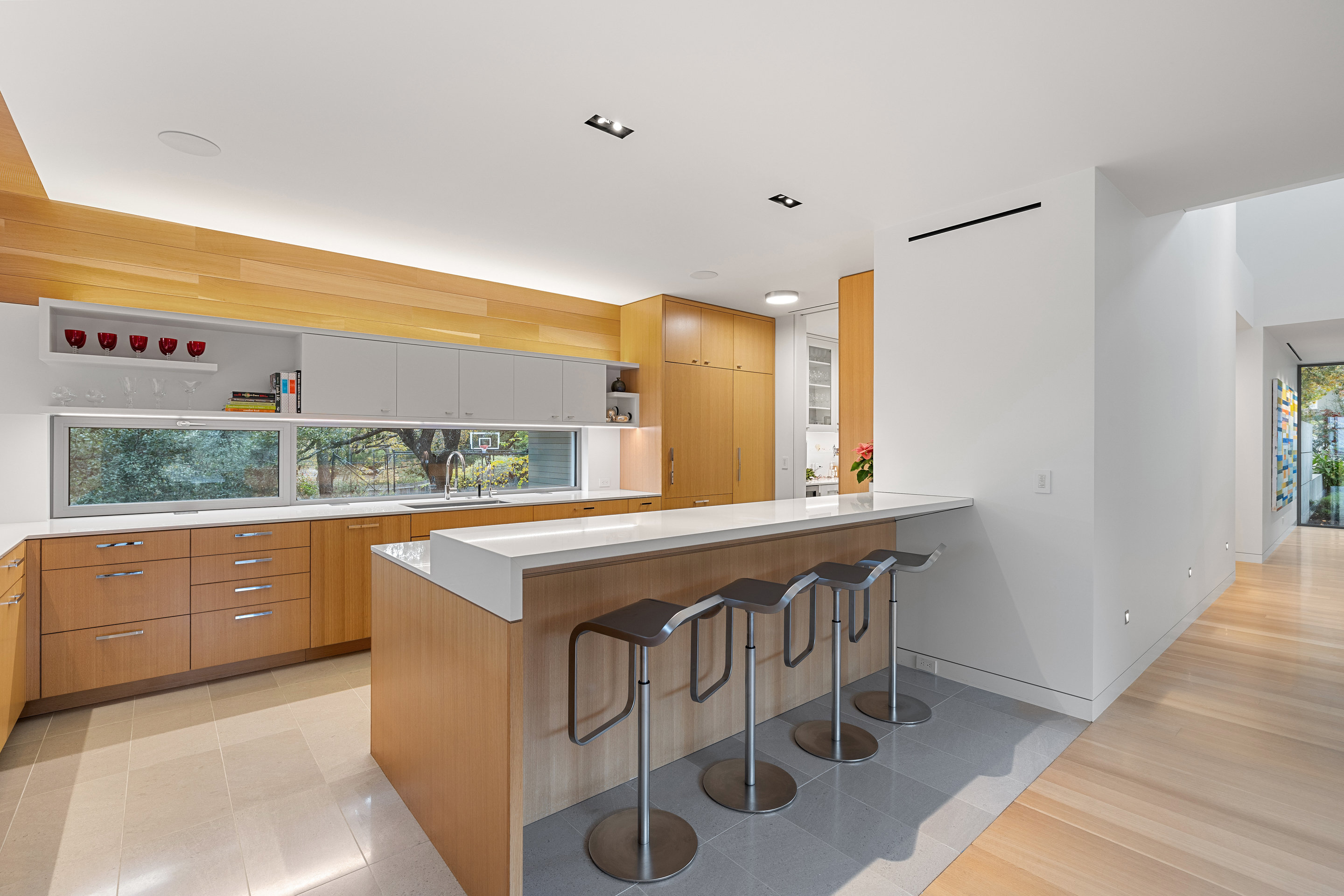 Primary bath with soaking tub and view to private garden