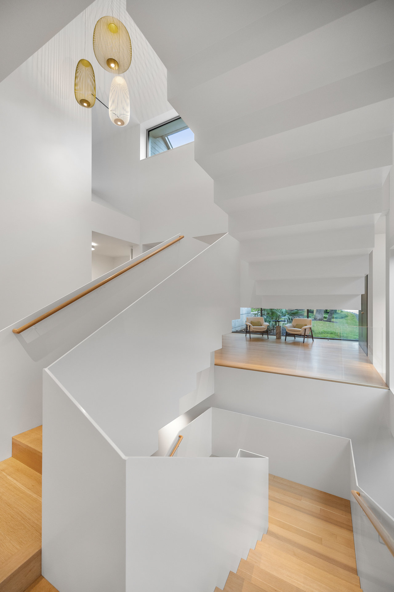 Primary suite sitting area with balcony access