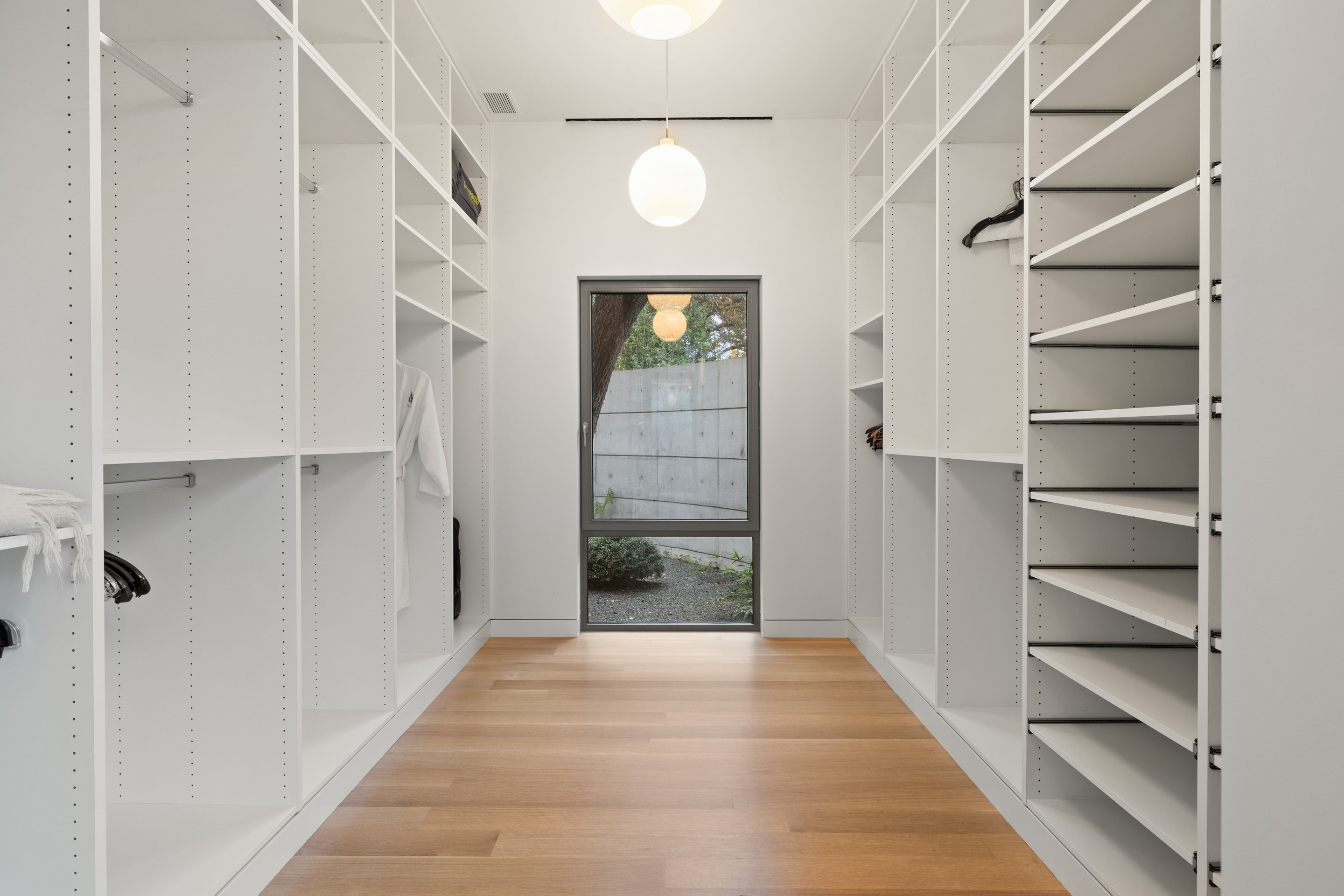 Guest bathroom with walk-in shower and natural stone