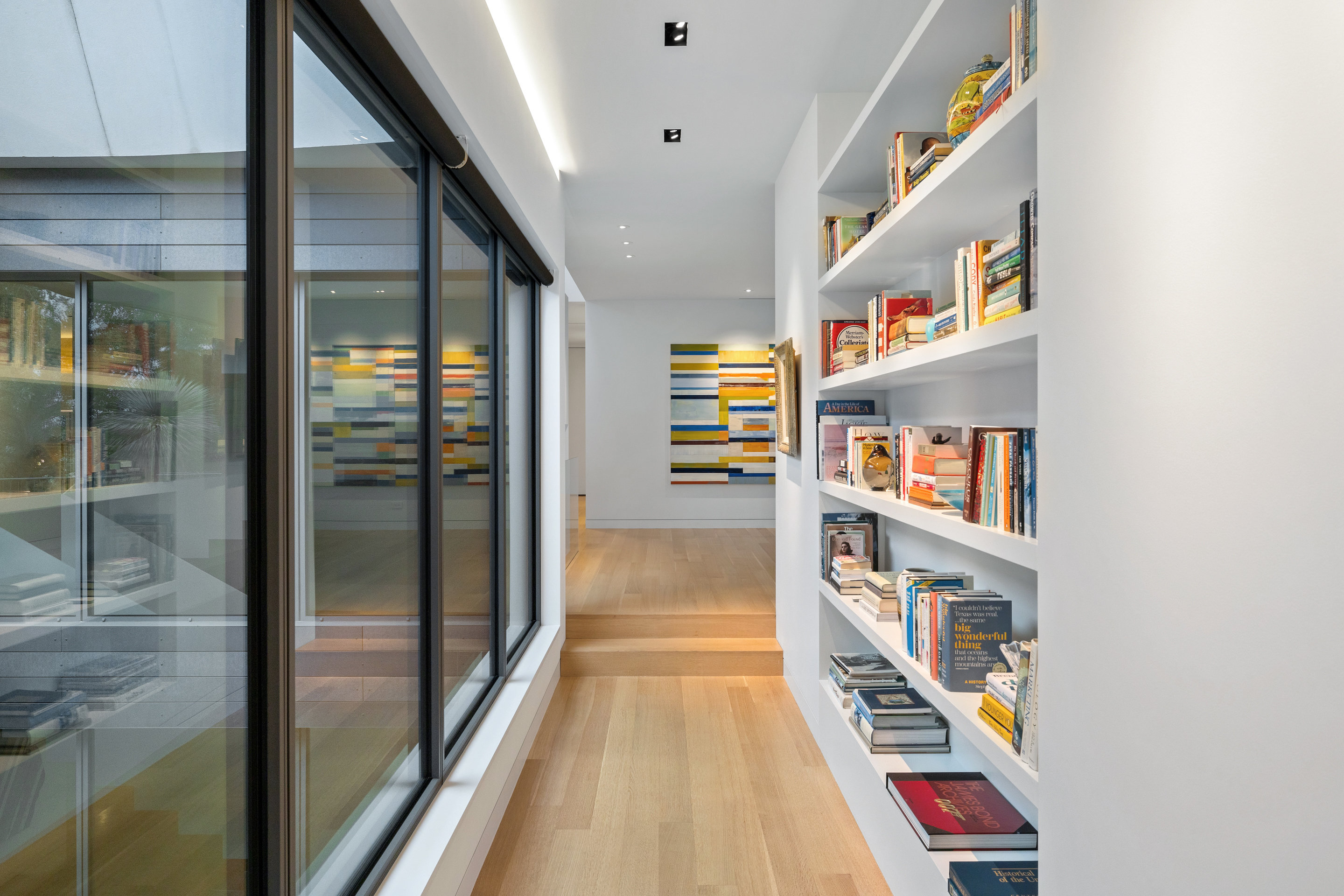 Lower bedroom with built-in wardrobe and garden view
