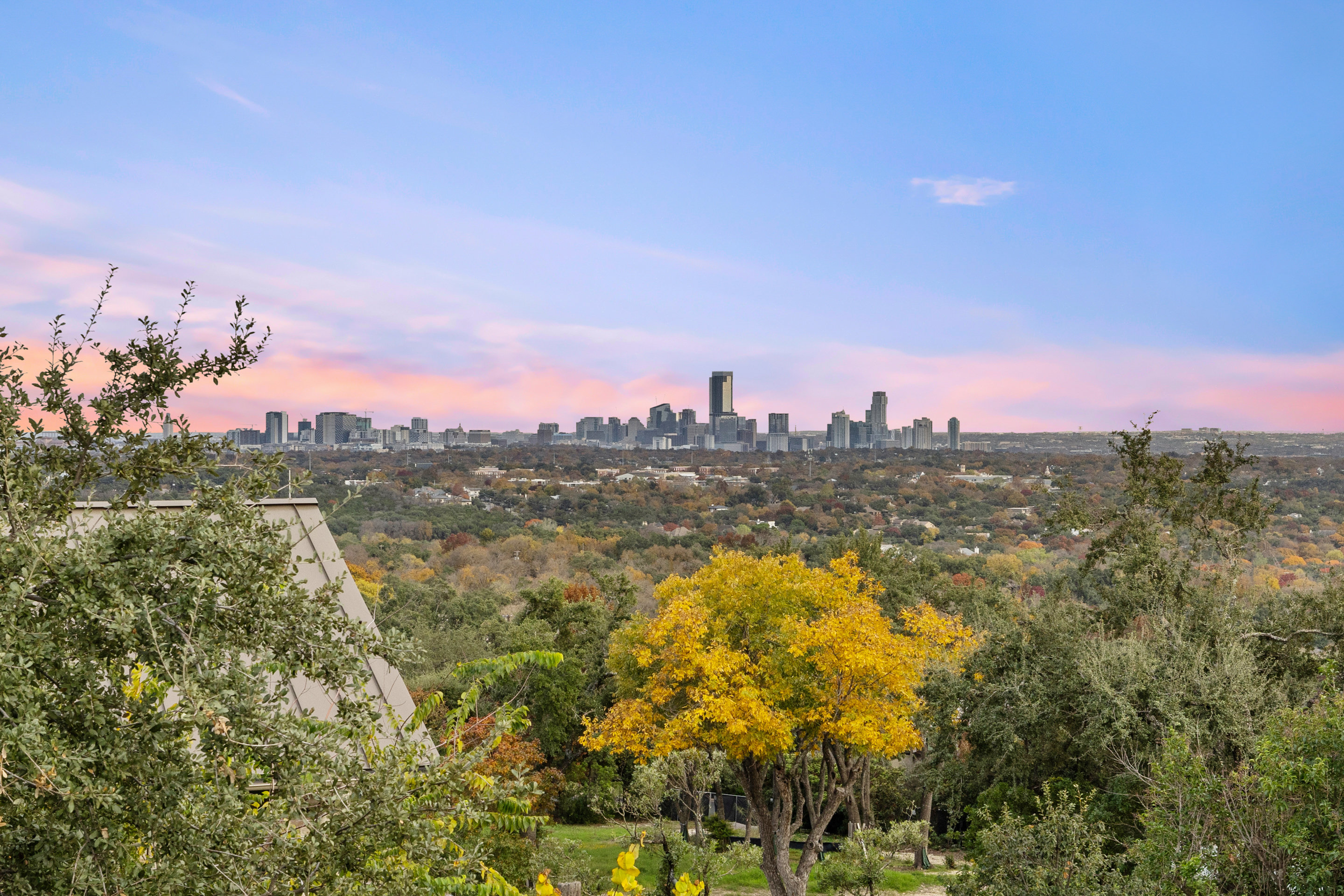 Lower bathroom with walk-in shower and concrete wall detail