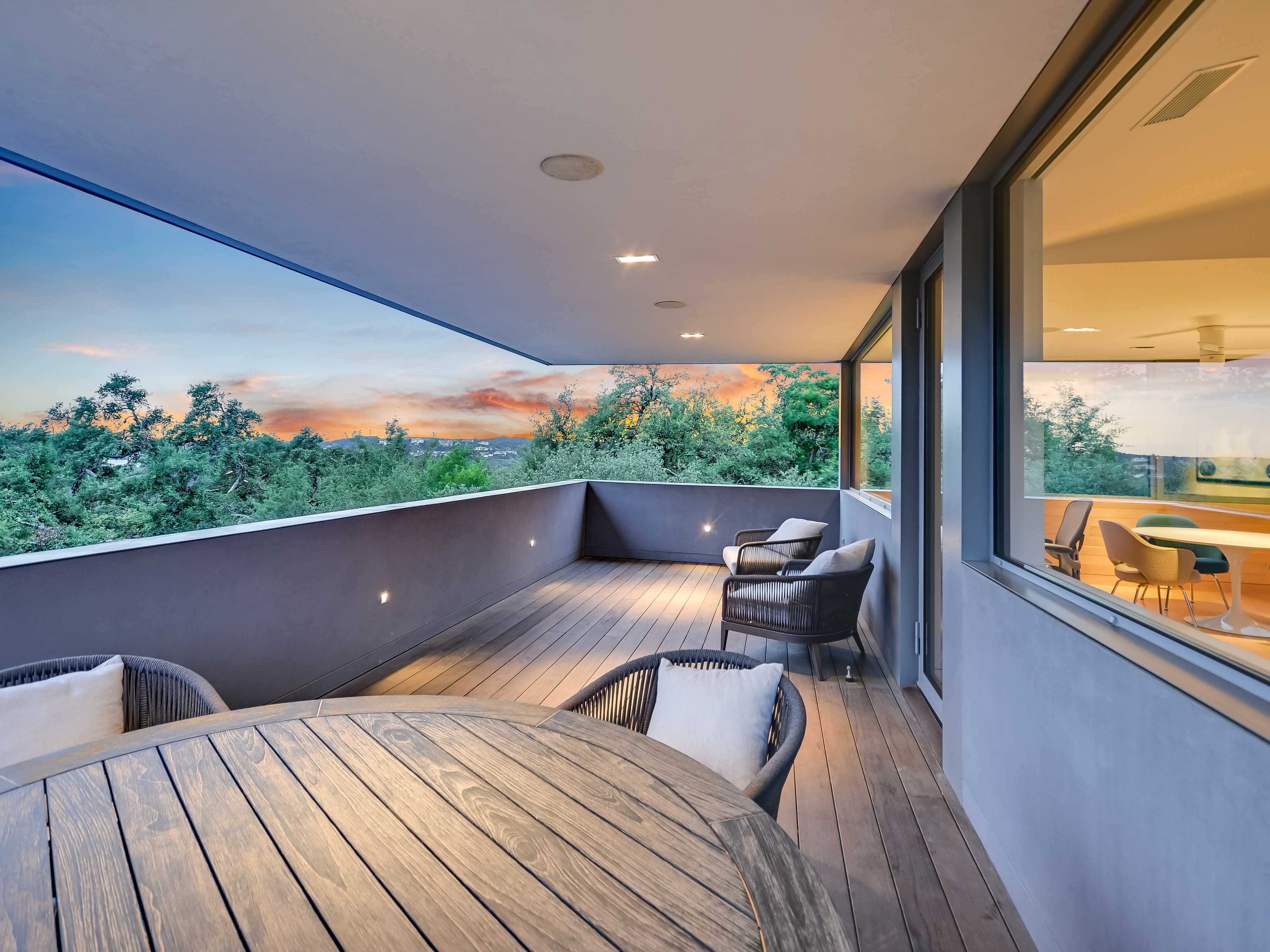 Upper deck view at twilight with city lights emerging