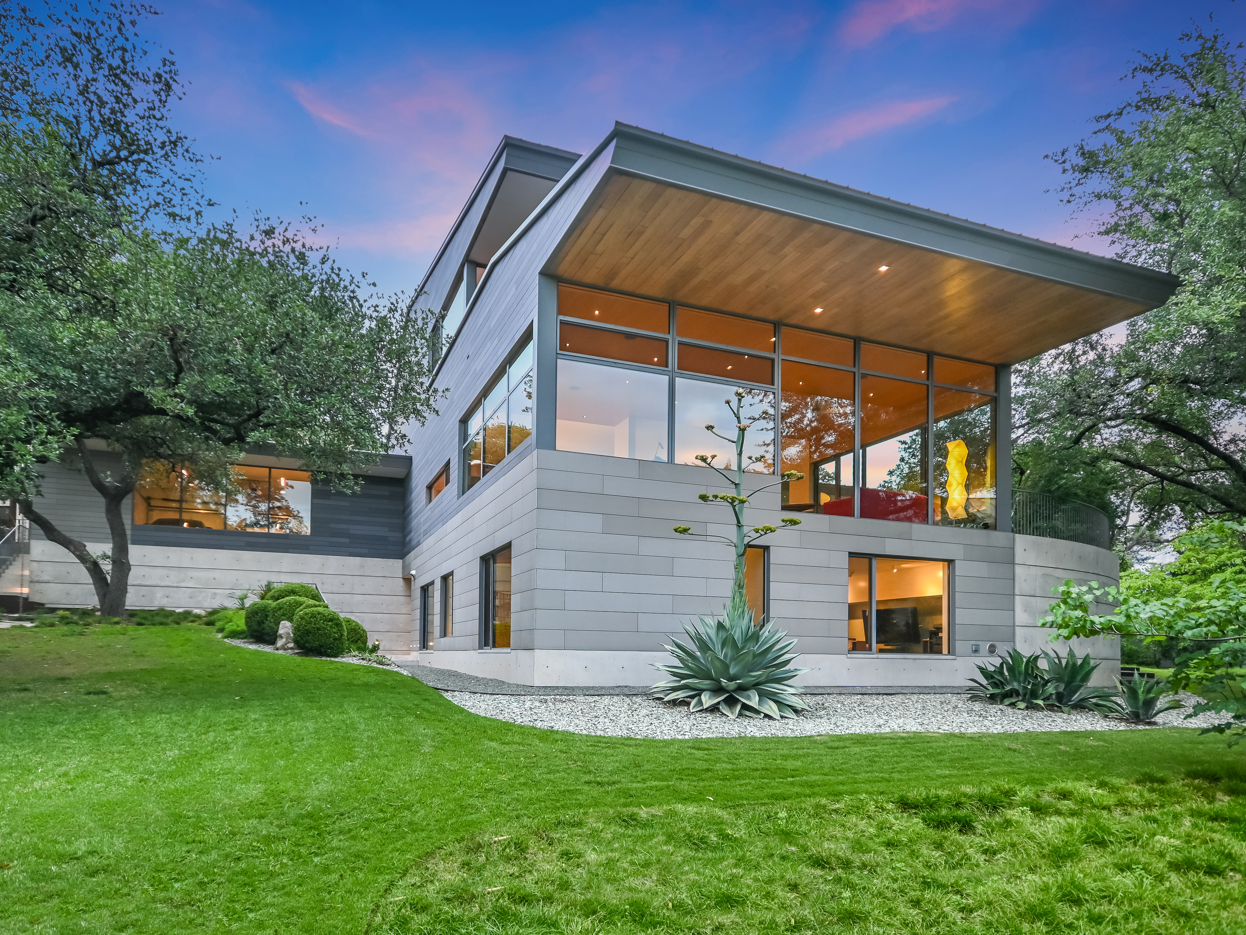 Rear exterior showing multi-level composition and landscape integration