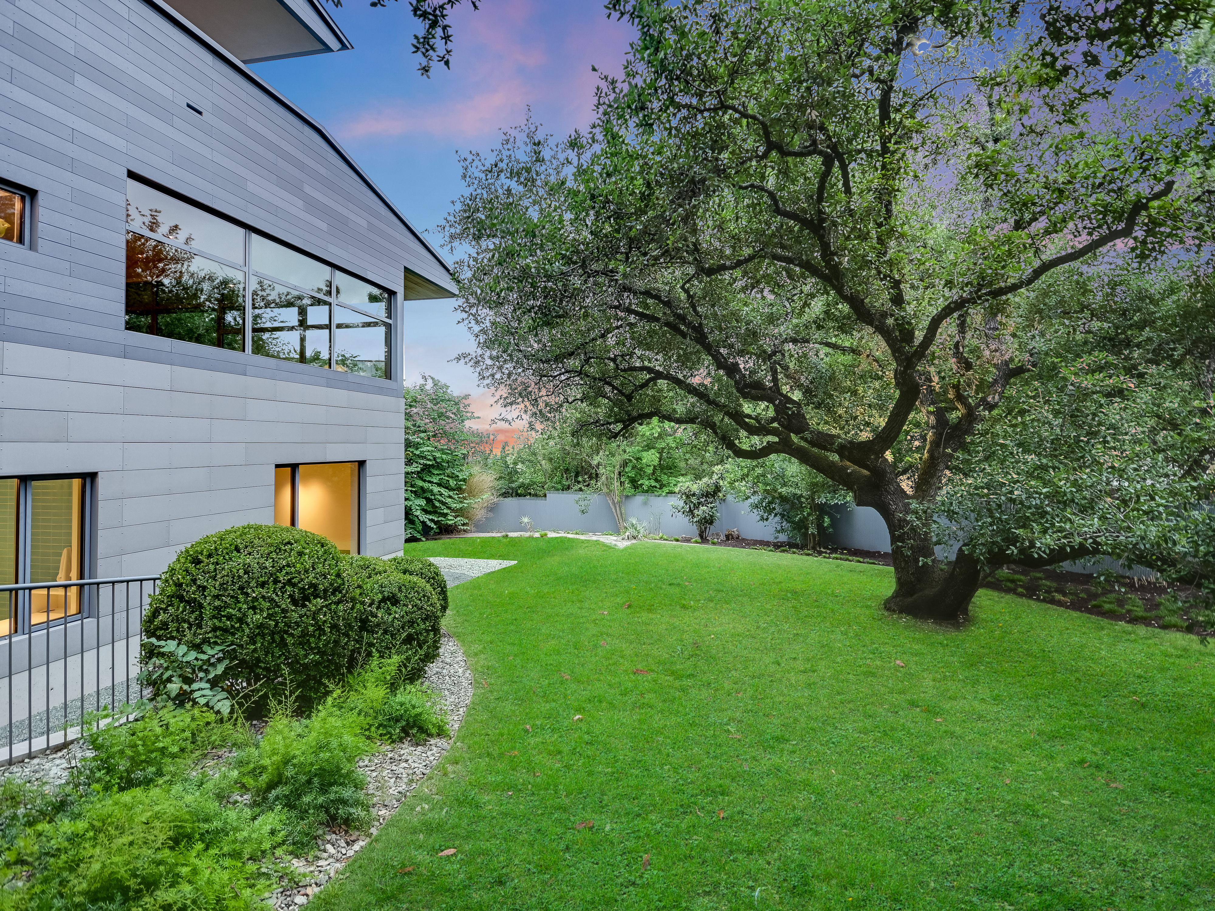 Property grounds with native grasses and Hill Country vegetation