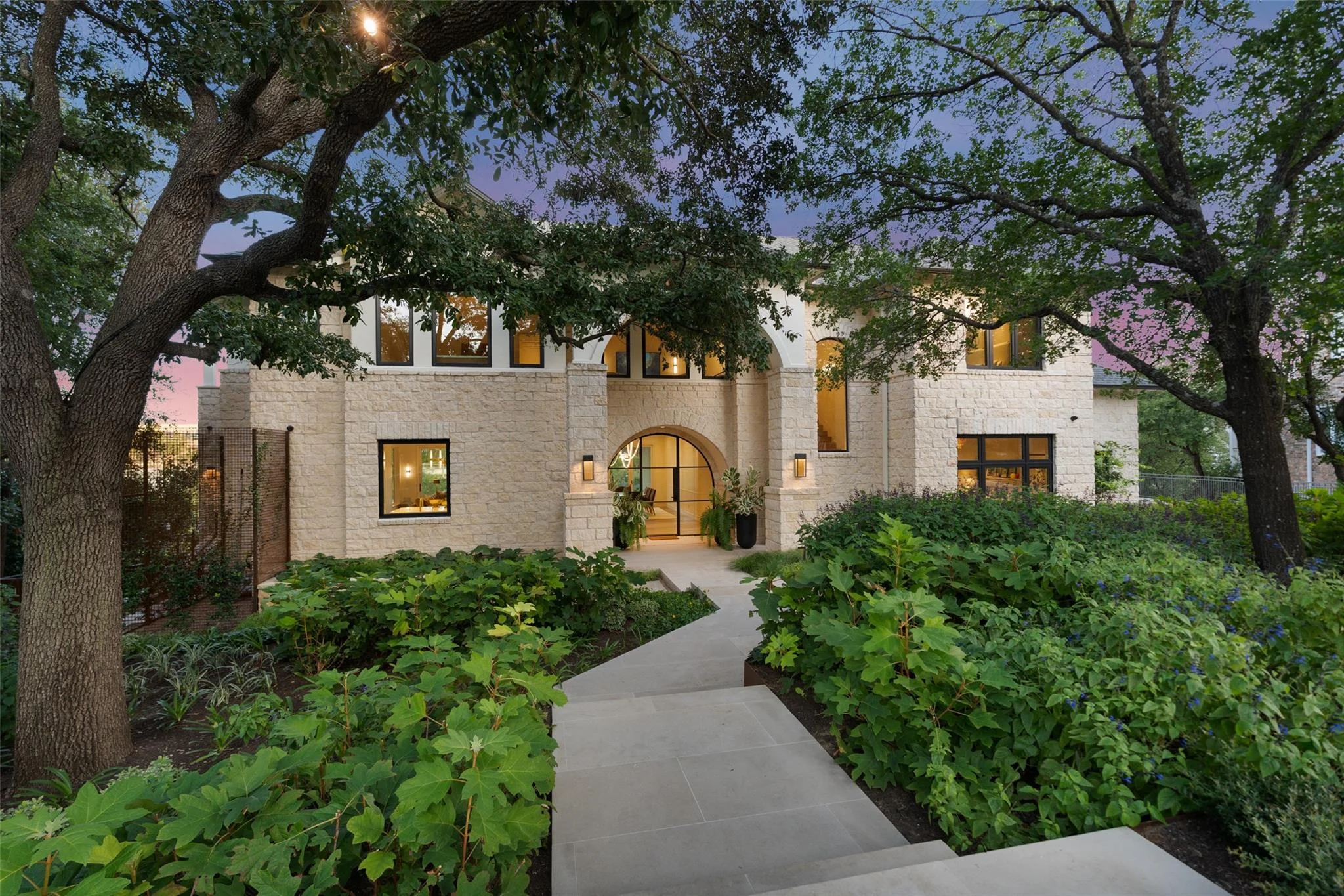 Rollingwood residential setting with established homes, mature trees, and close-in 78746 neighborhood character
