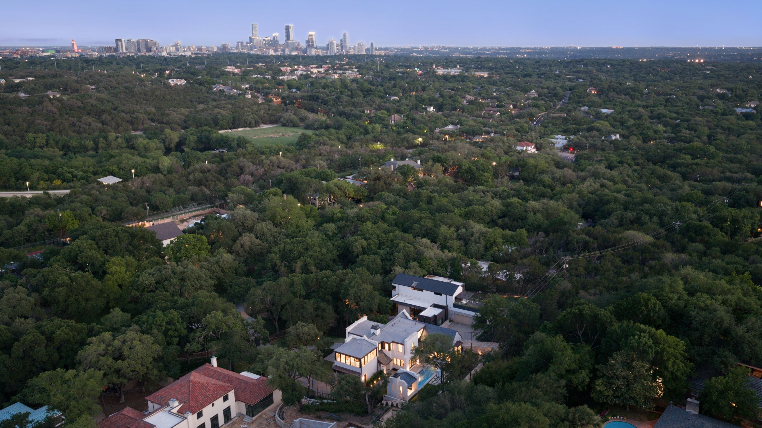 3802 Balcones Drive skyline aerial dusk