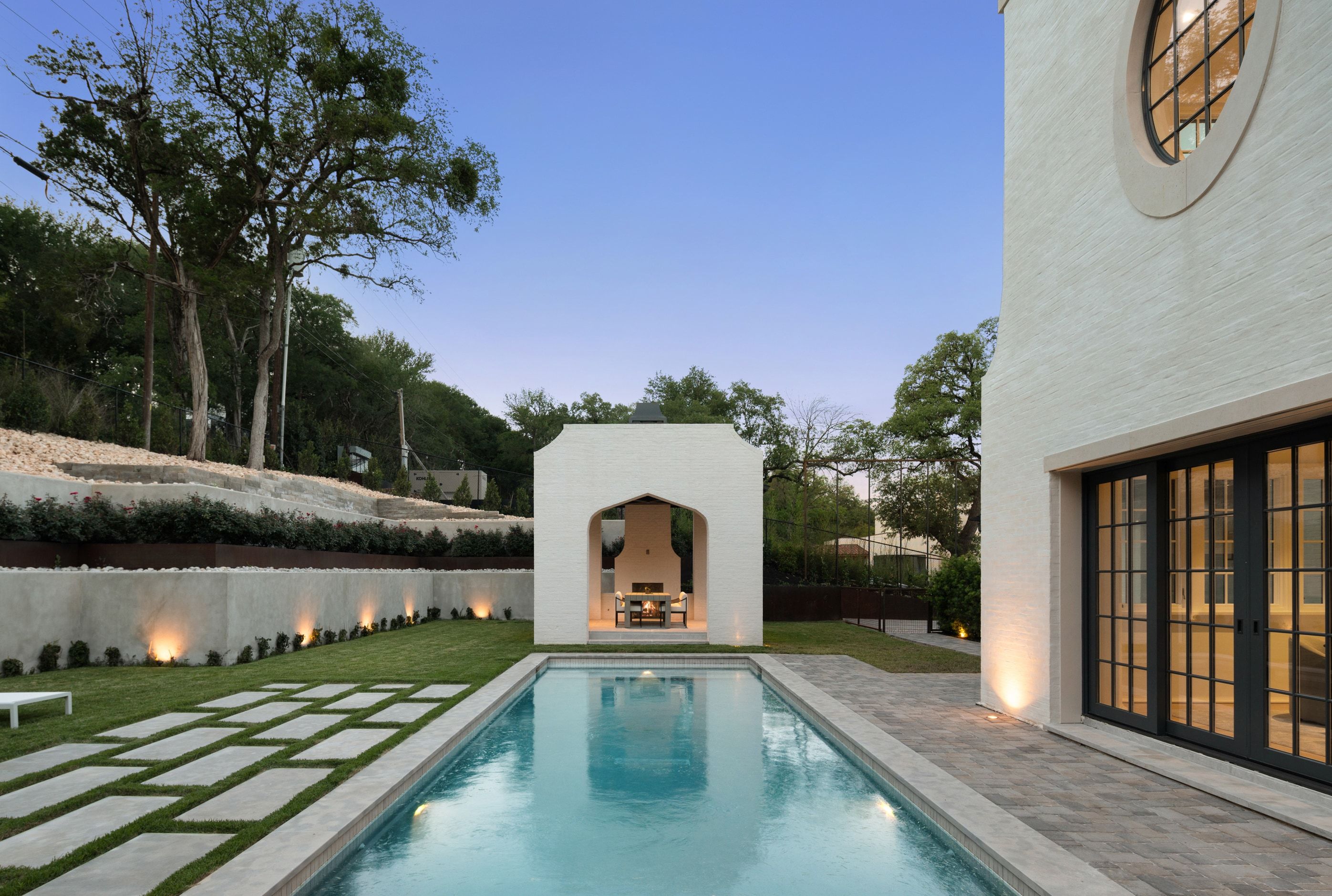 3802 Balcones Drive pool courtyard twilight