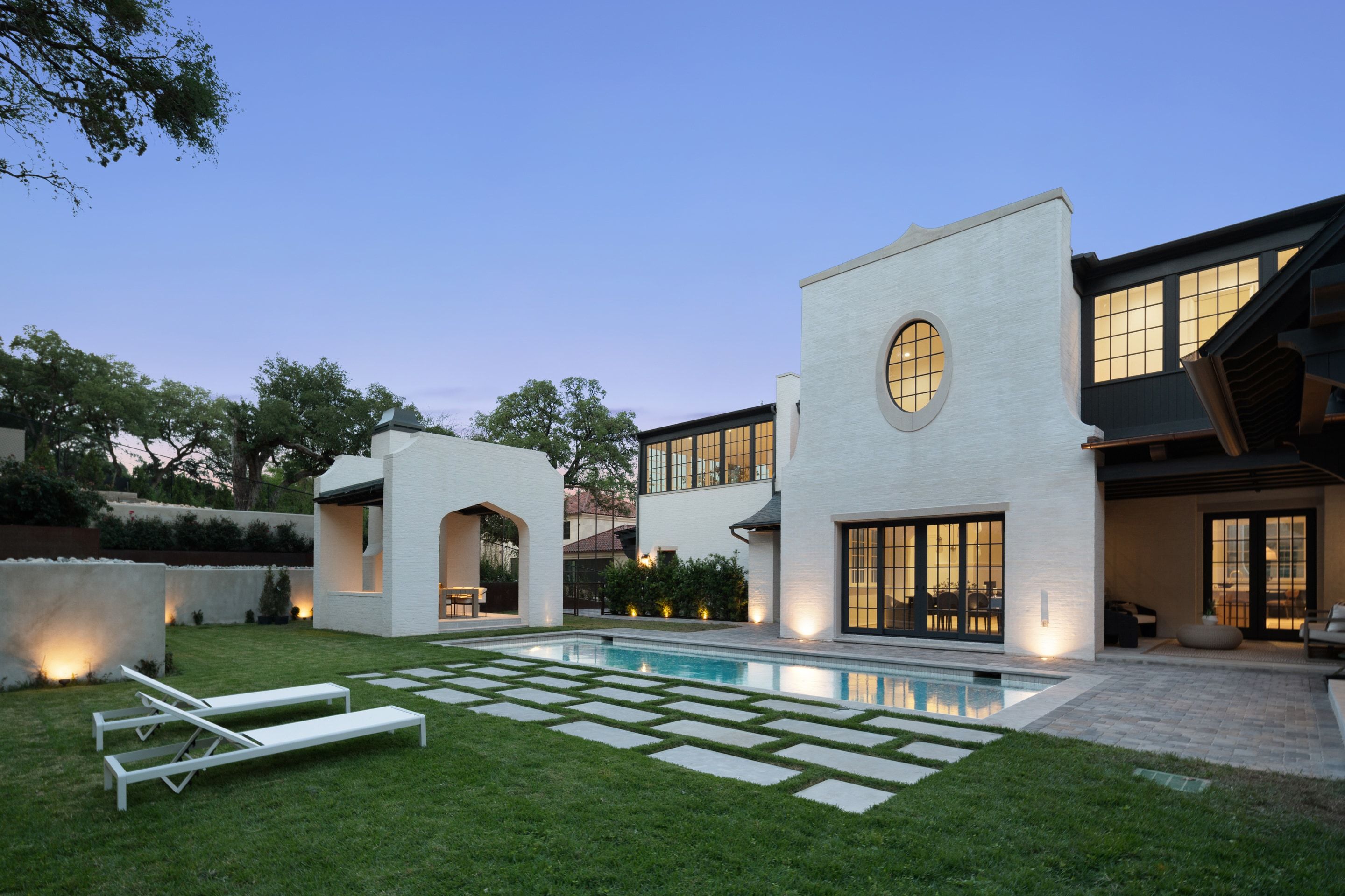 3802 Balcones Drive pool lawn twilight