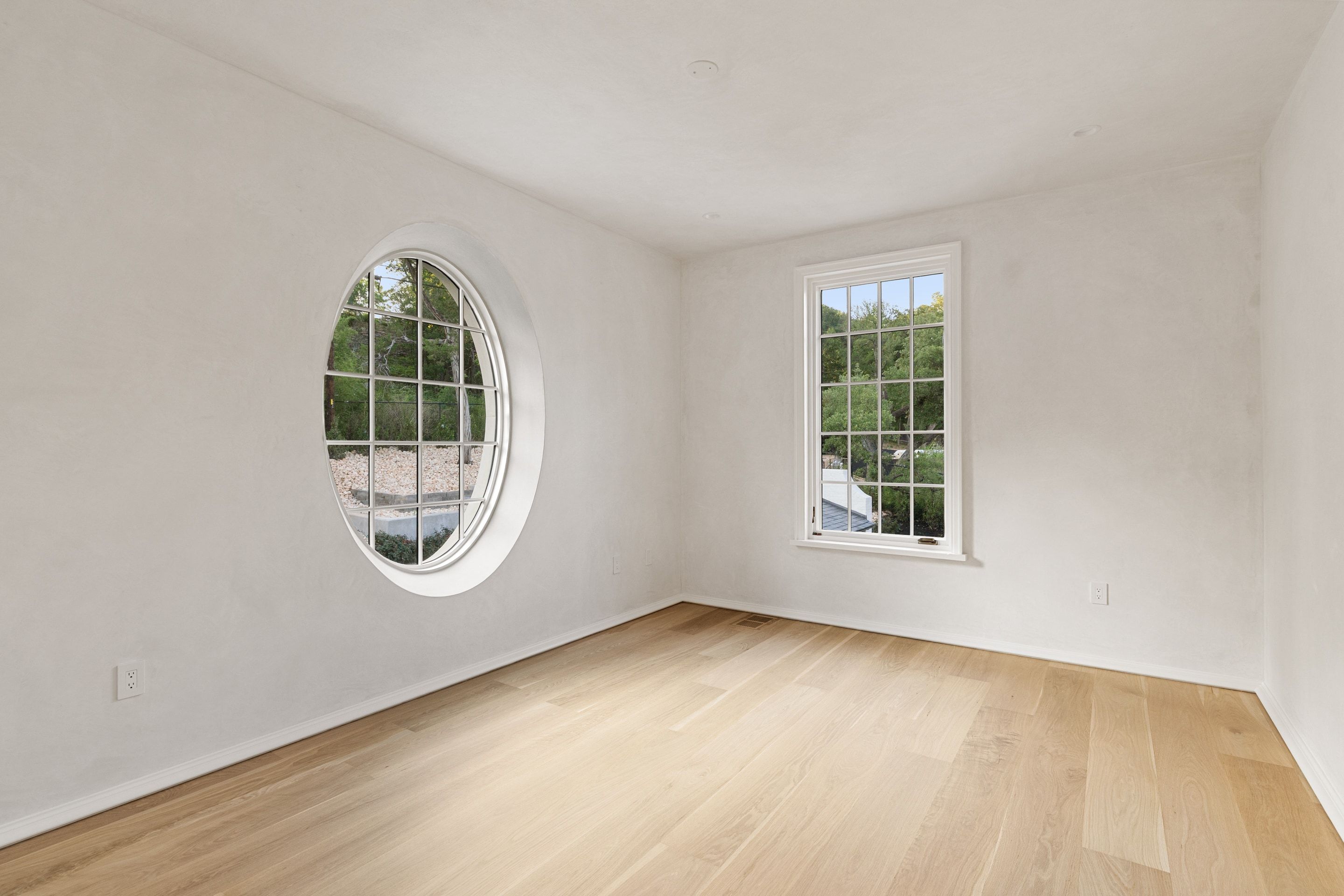 3802 Balcones Drive secondary bedroom round window