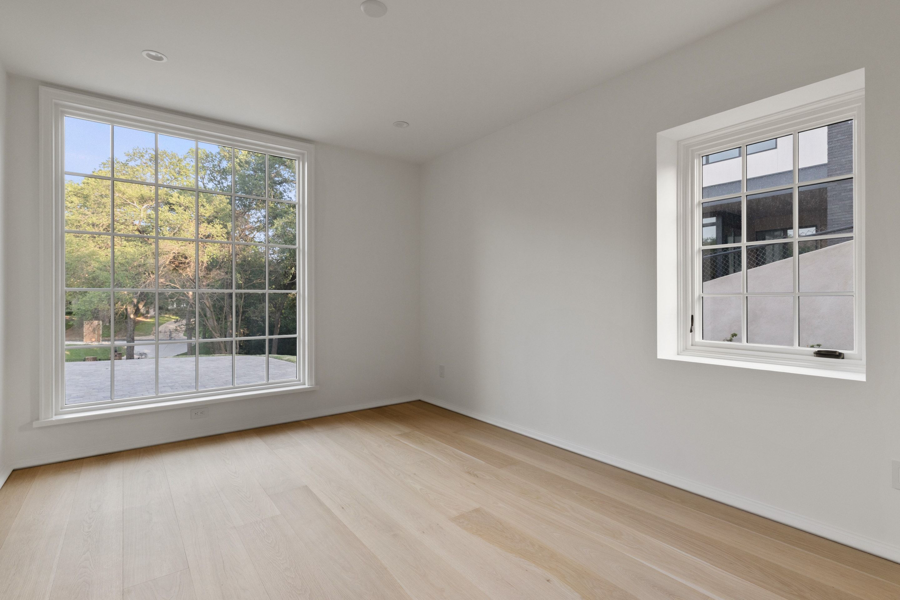 3802 Balcones Drive secondary bedroom corner windows
