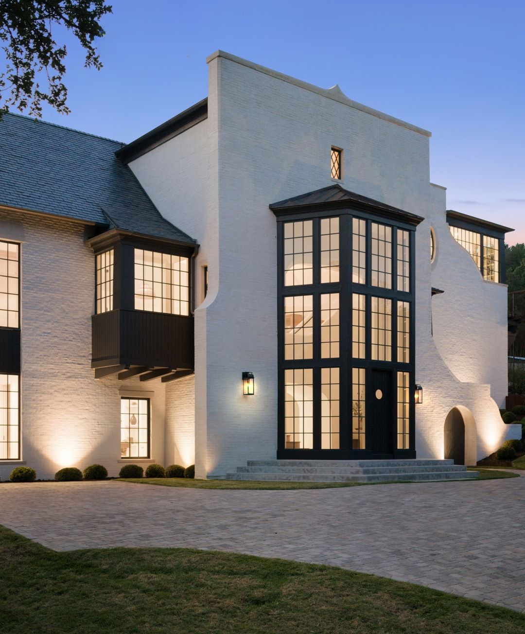 3802 Balcones Drive front bay window dusk