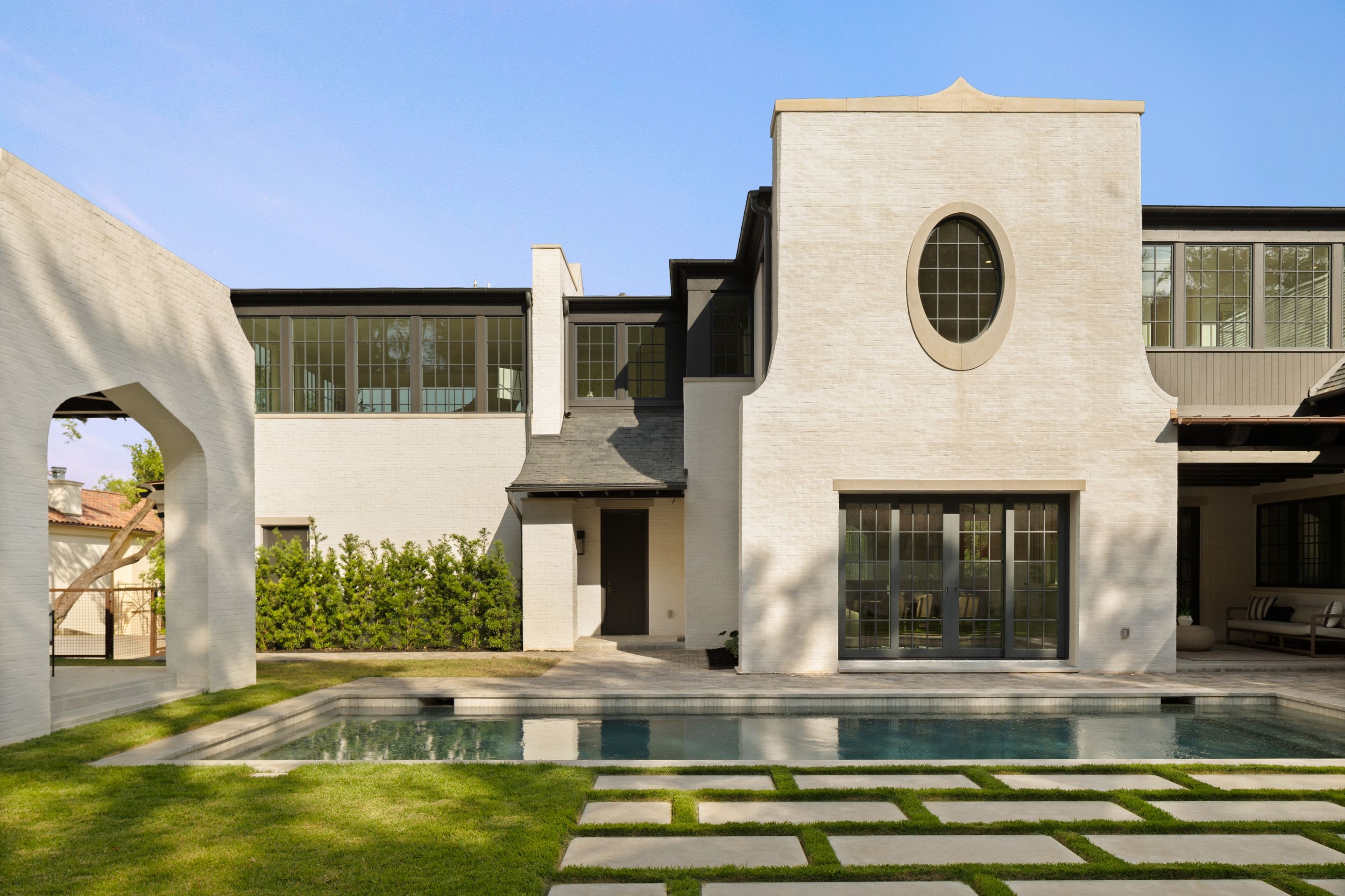 3802 Balcones Drive rear elevation pool day