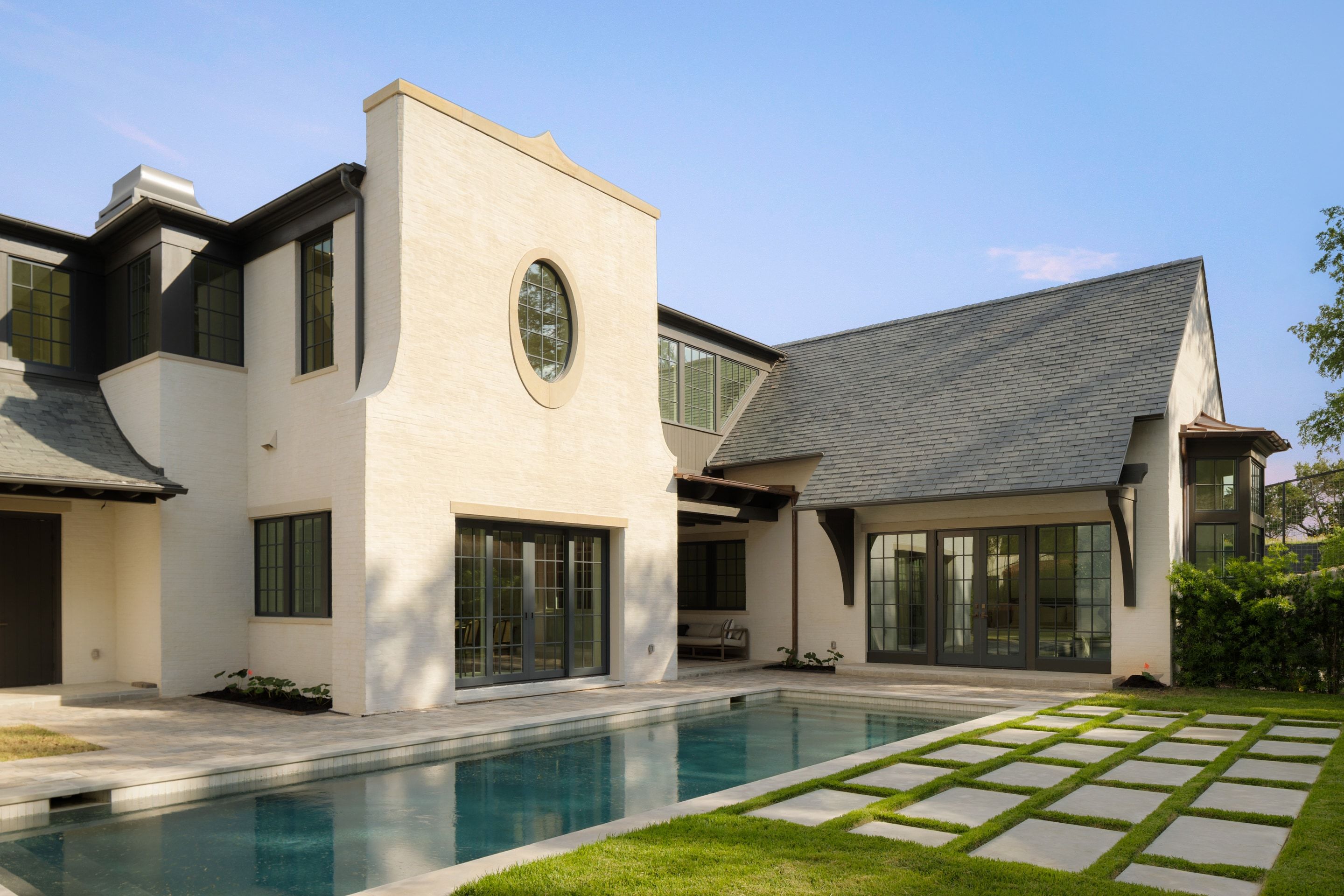 3802 Balcones Drive rear elevation pool angle day