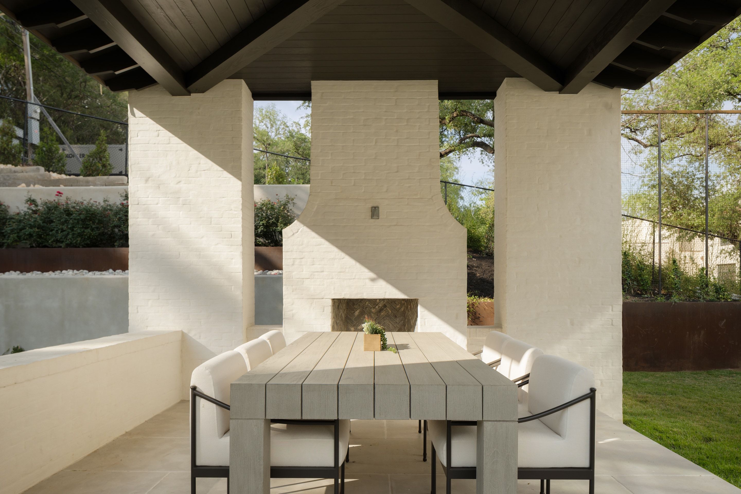 3802 Balcones Drive covered patio fireplace day
