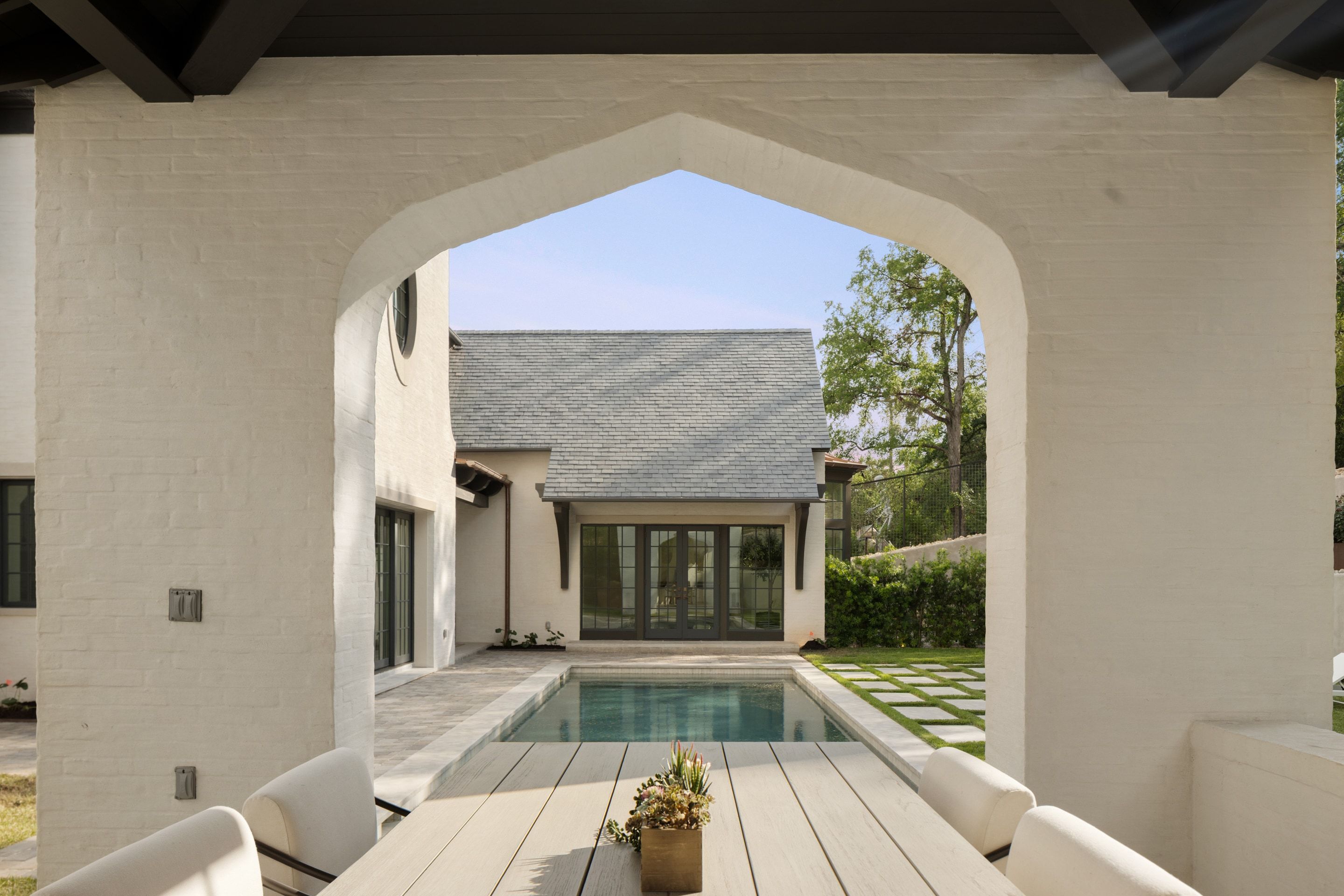 3802 Balcones Drive covered patio arch view day
