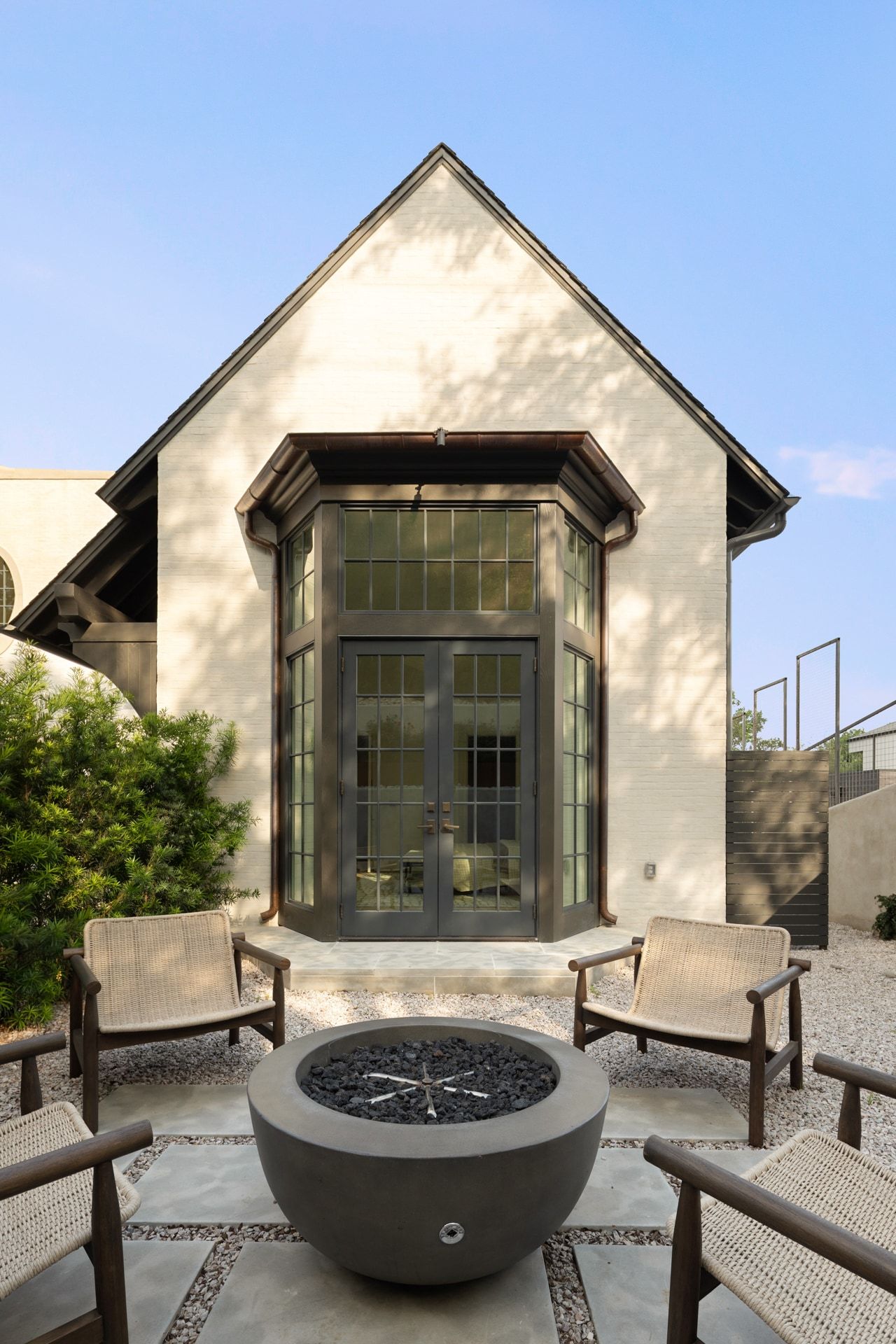 3802 Balcones Drive steel and glass bay entry day