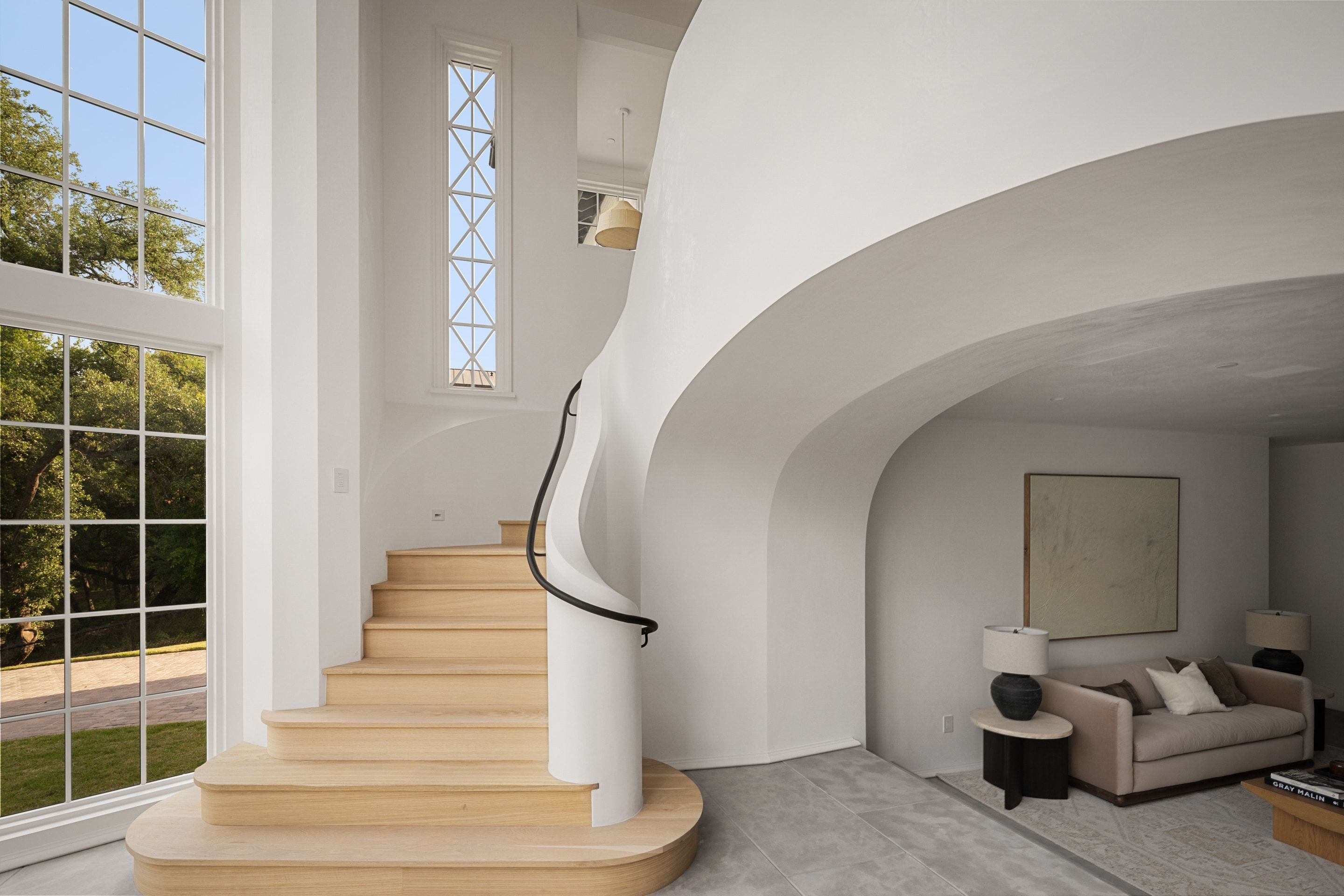 3802 Balcones Drive curved stair and window wall