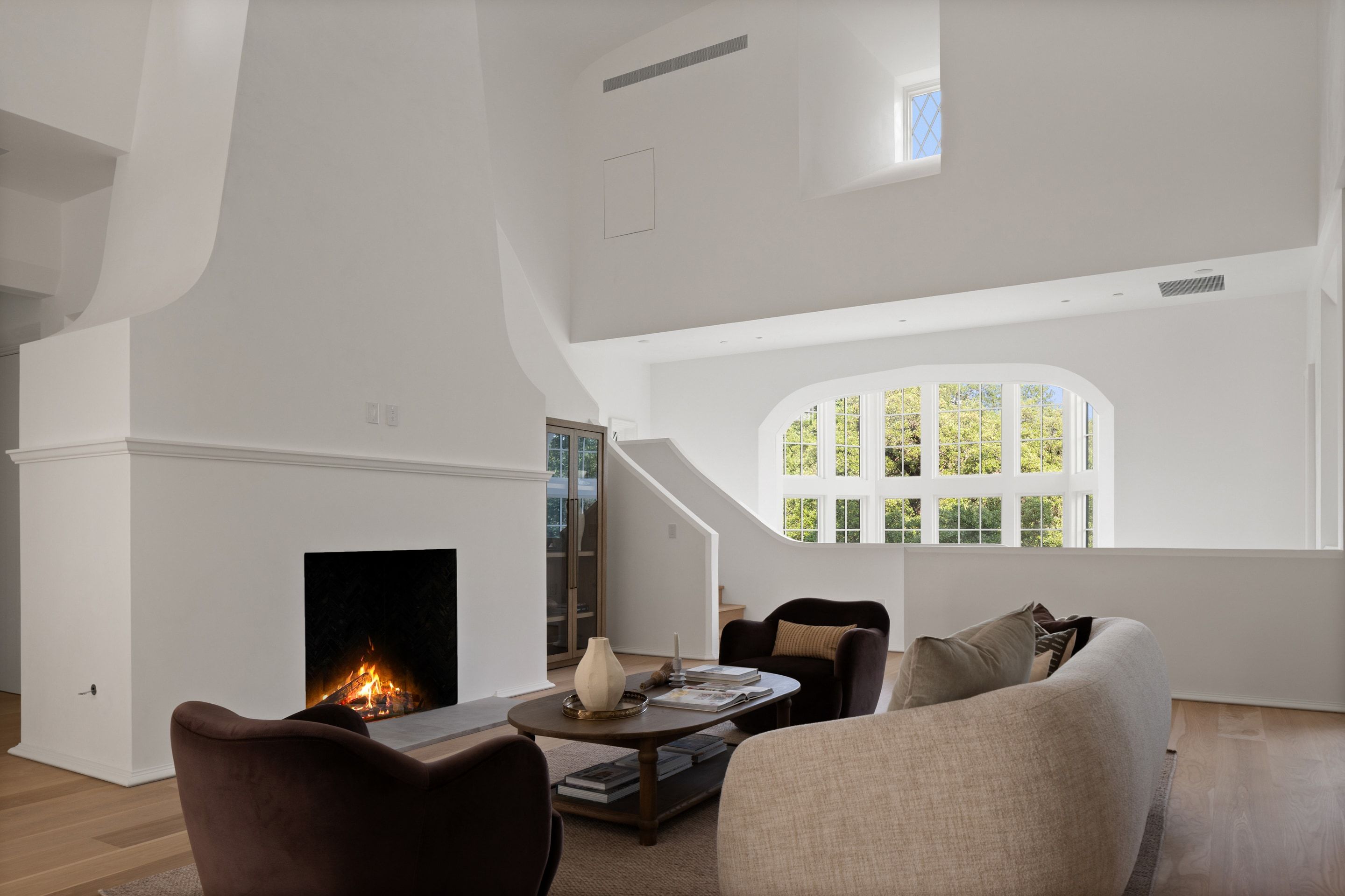 3802 Balcones Drive living room fireplace and window