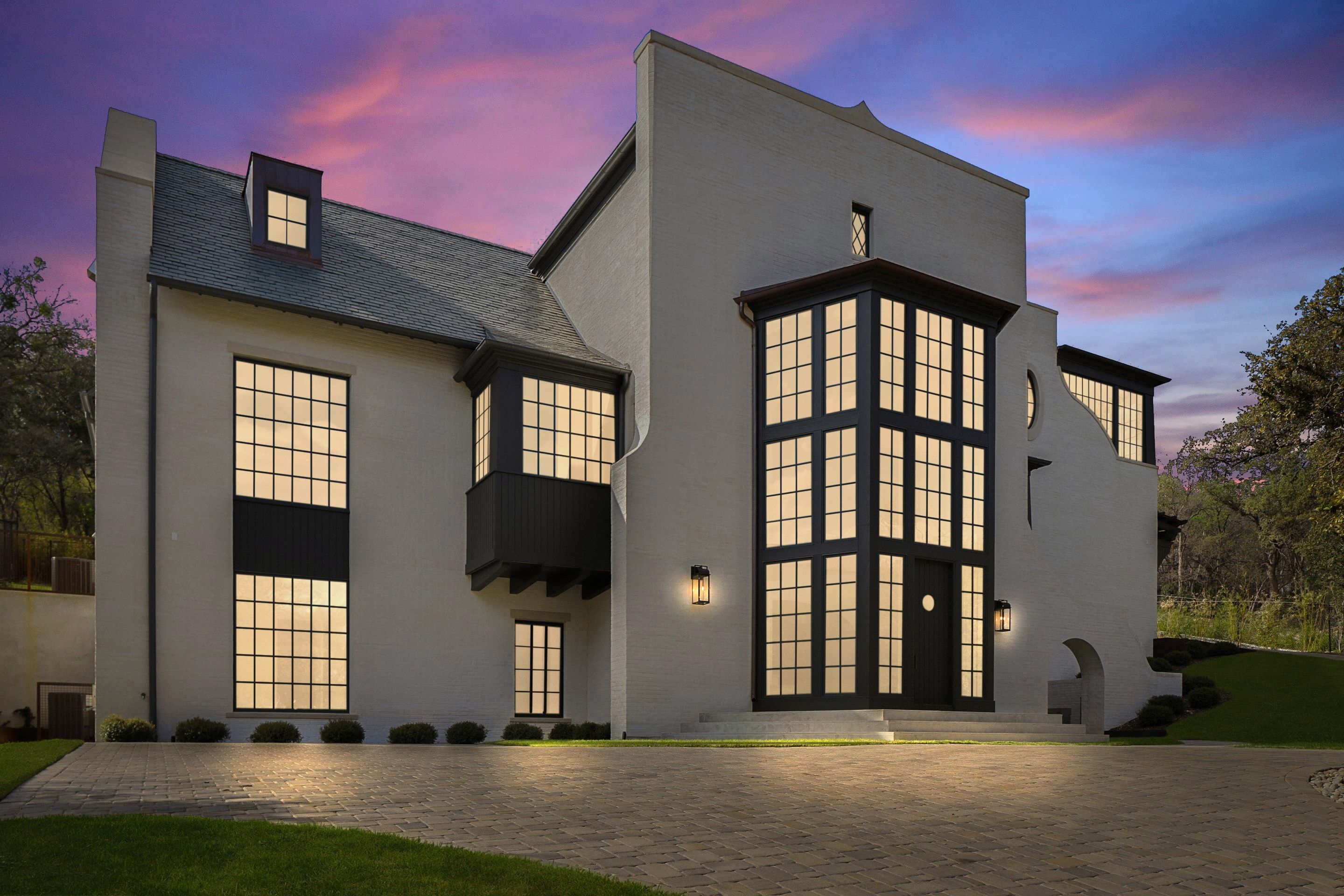 3802 Balcones Drive front entry bay twilight alt