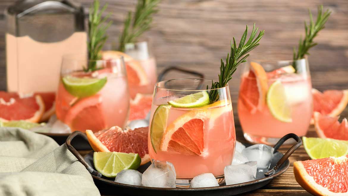 Pink cocktails with citrus and herbs.