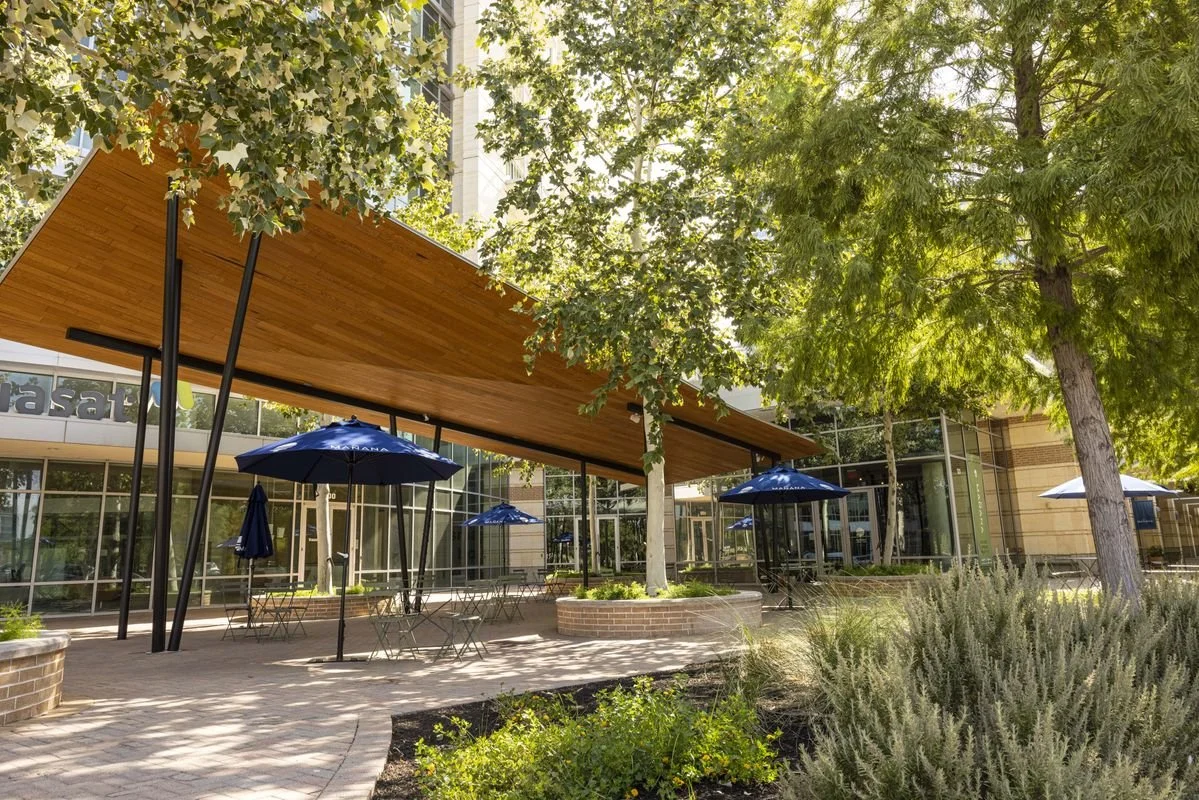 A building and shaded courtyard.