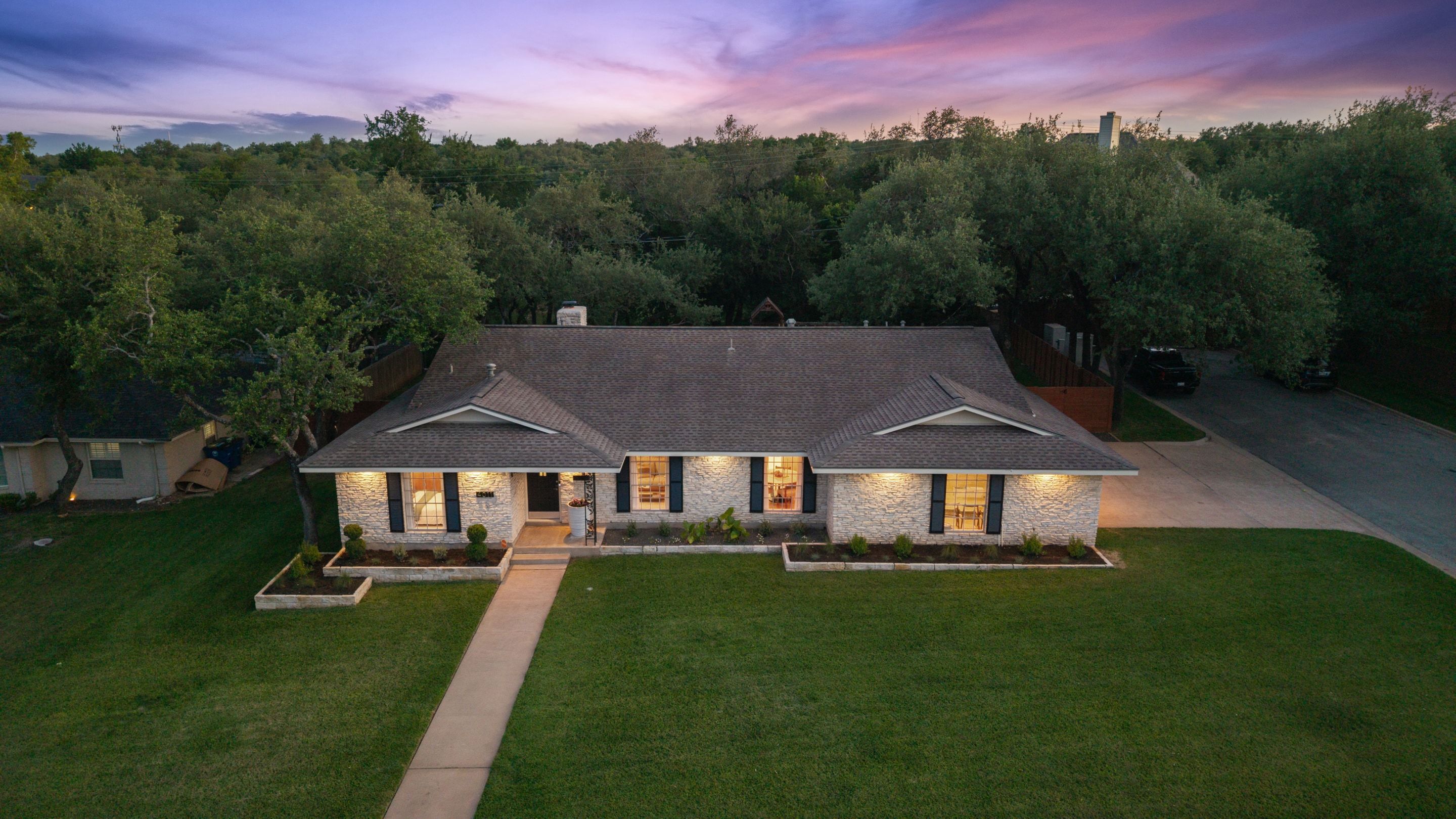 Newsletter image accompanying the archived property feature for 4011 Greystone Dr, 78731.