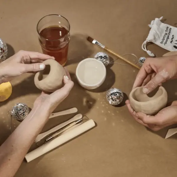 Newsletter image accompanying Sip & Sculpt Pottery Workshop.