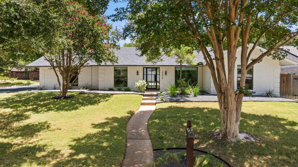 Newsletter image accompanying the archived property feature for 9009 Rockcrest Drive.